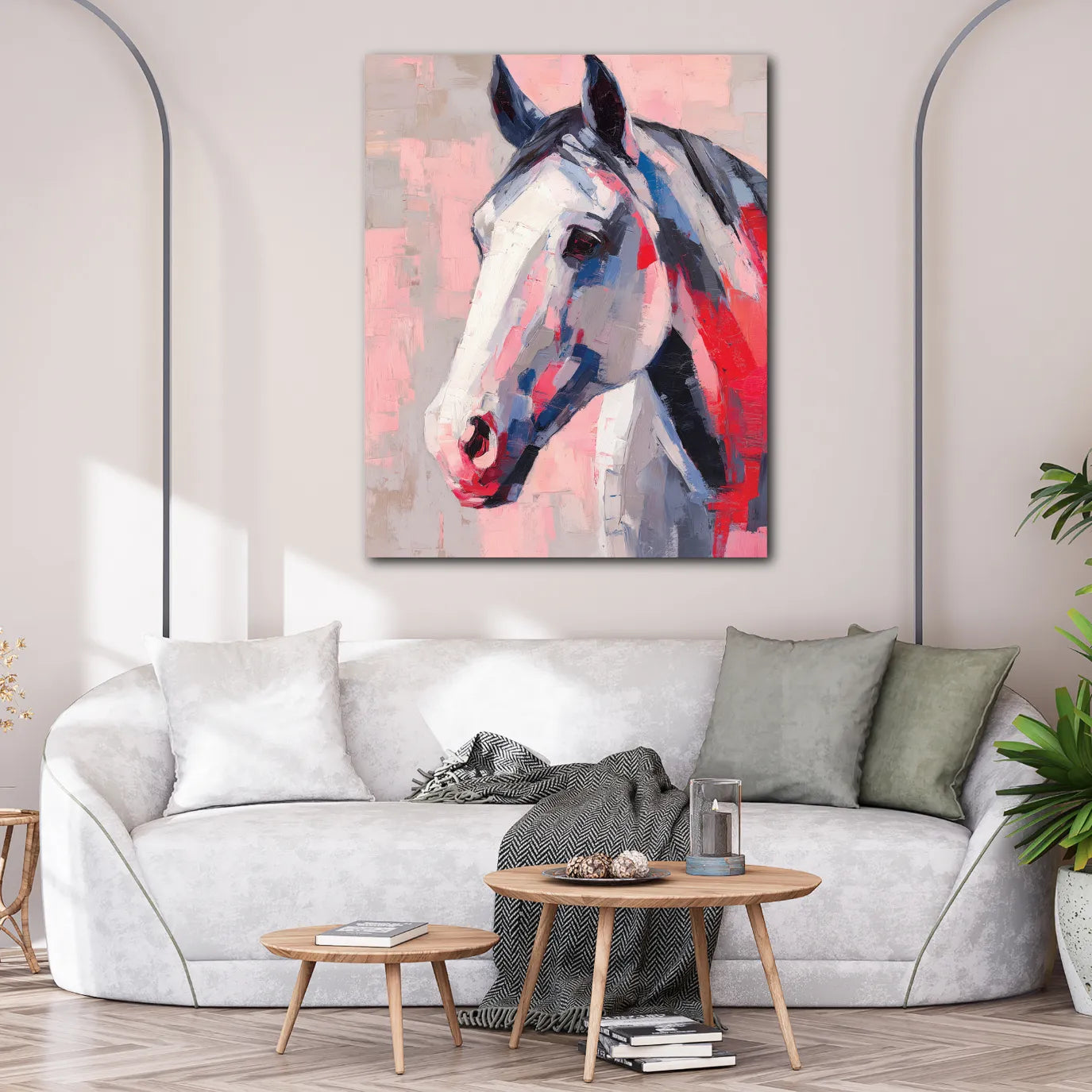 Living room with a gray sofa, small round wooden coffee table, and a colorful abstract painting of a horse on the wall.