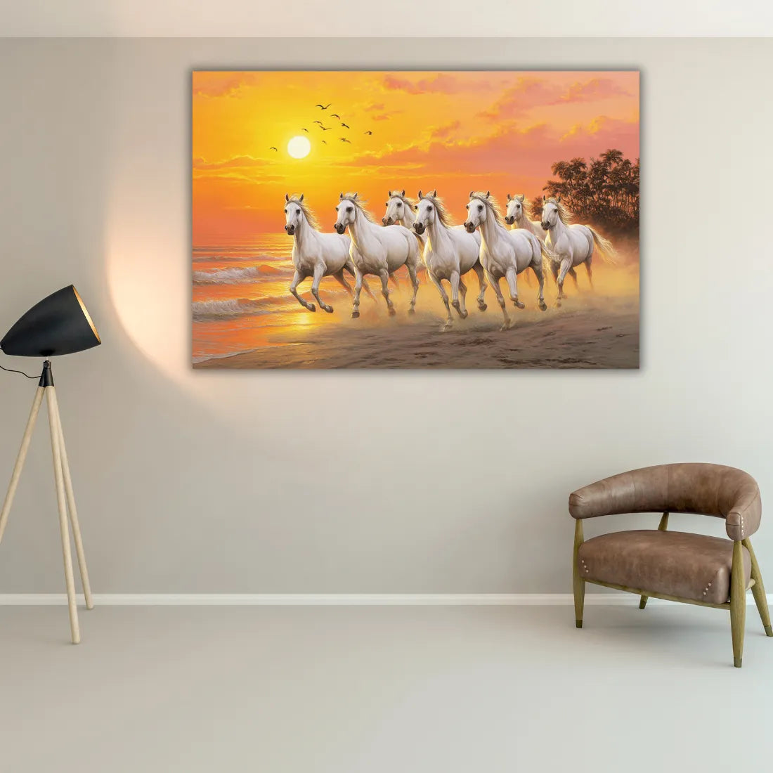 Canvas print of horses running on a beach in a room with a lamp and chair.