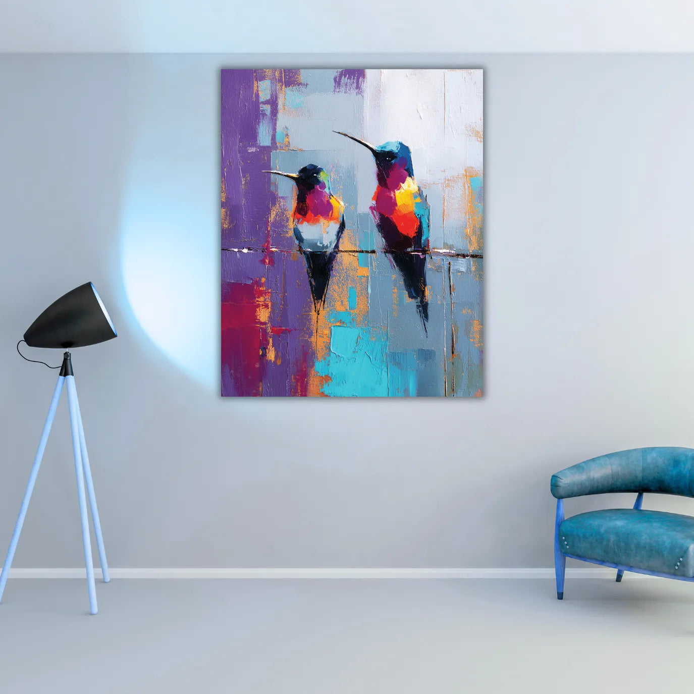 Colorful abstract painting of two birds on a gray wall with a modern chair and floor lamp.