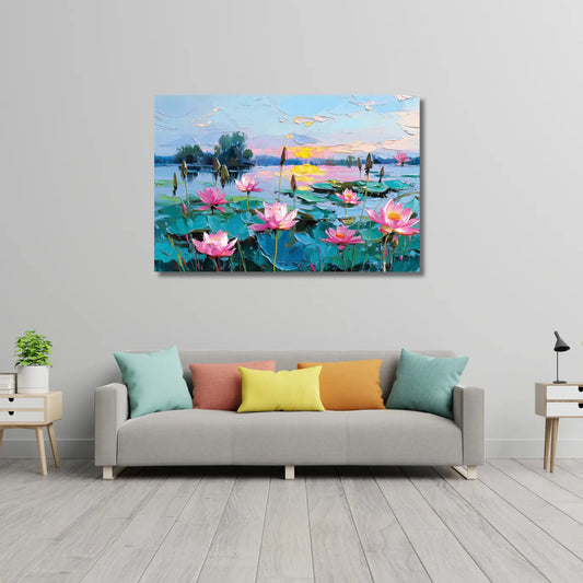 Colorful painting of a lake with pink lotus flowers on a gray wall above a sofa.