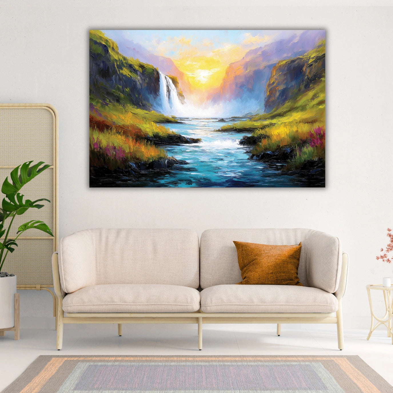 Landscape painting of a waterfall over a sofa in a living room